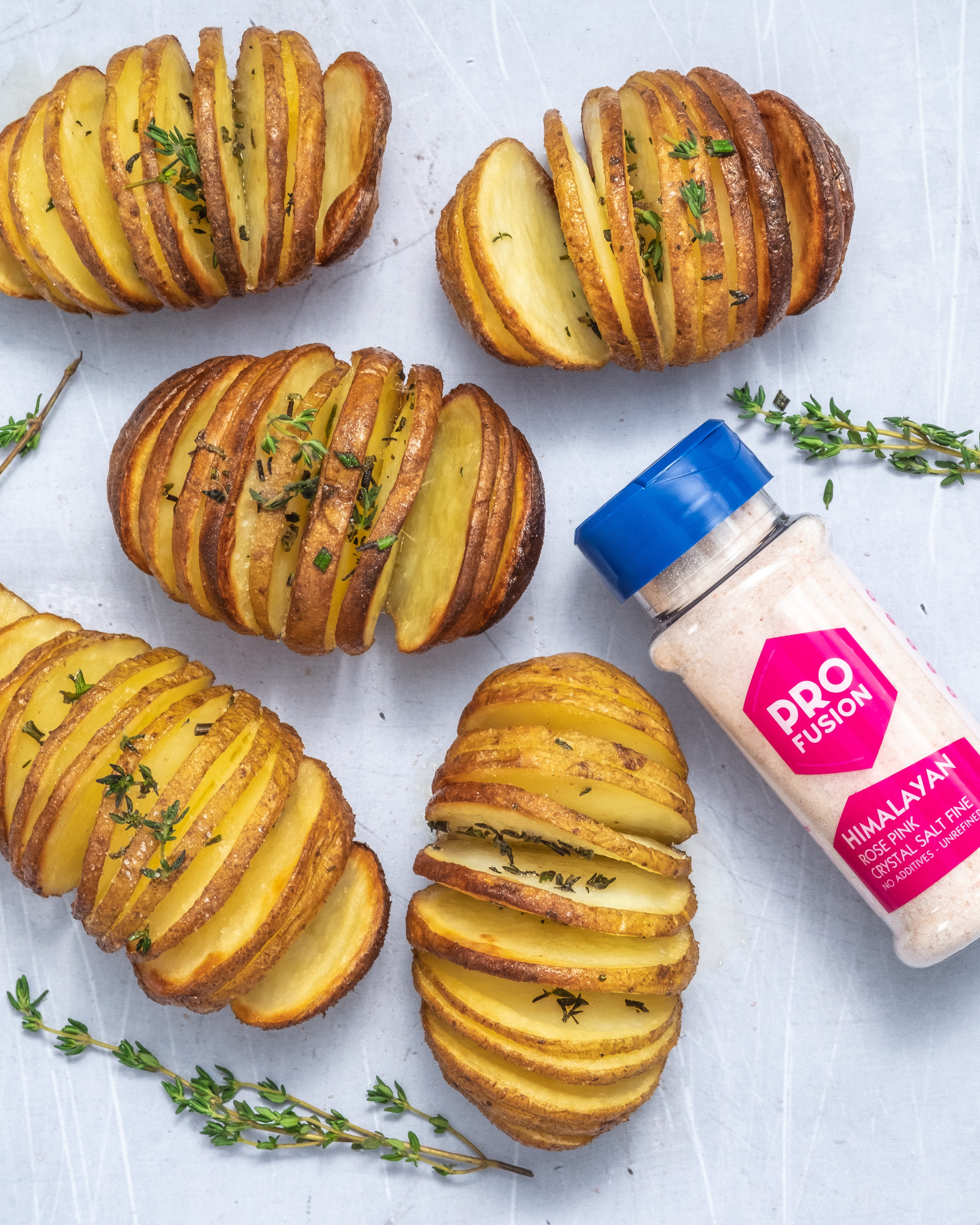 Herby Vegan Hasselback Potatoes with Pink Salt