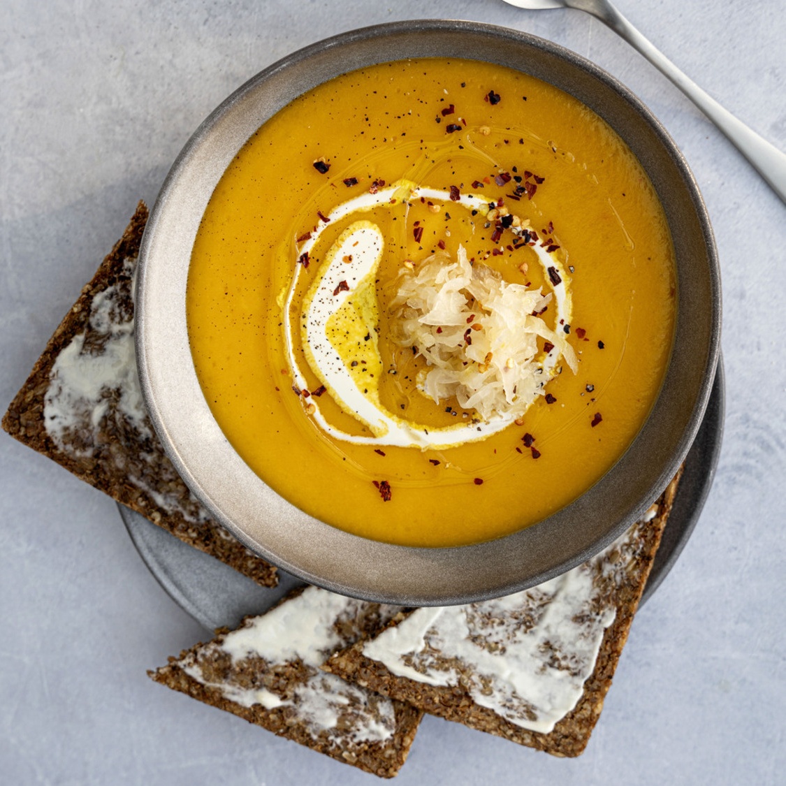 PUMPKIN SOUP TOPPED WITH SAUERKRAUT